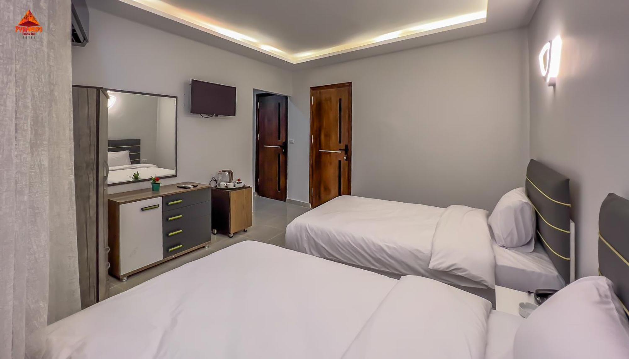Pyramids Tower View Inn Nazlet el Simman Bagian luar foto