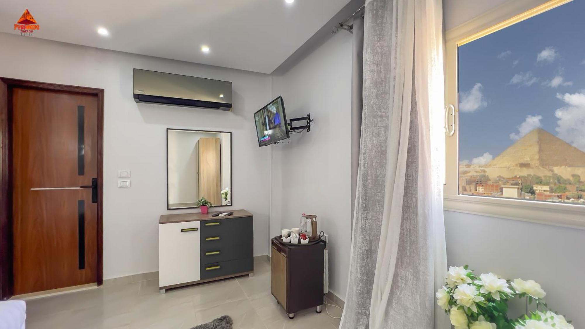 Pyramids Tower View Inn Nazlet el Simman Bagian luar foto
